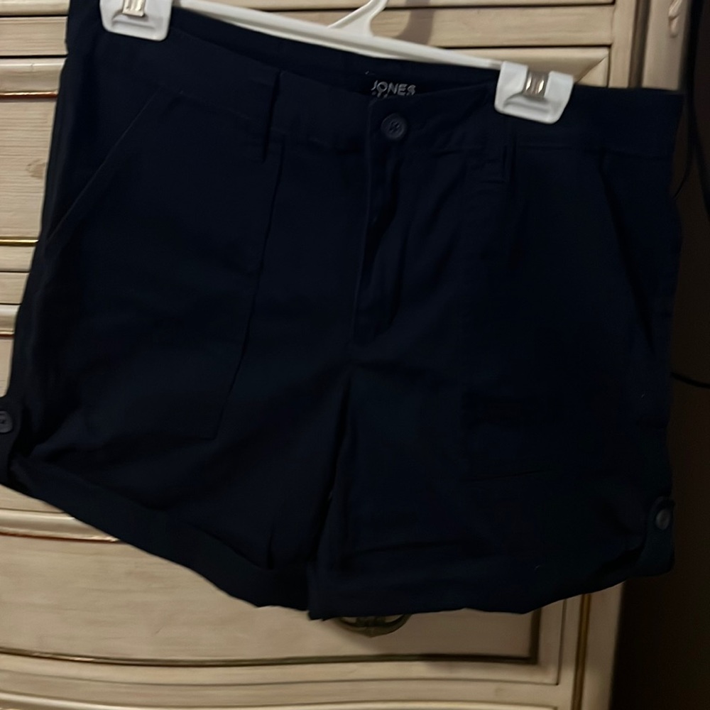 Black Jones New York shorts. Size 12. Roll at the bottom.